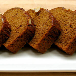 Picture of sliced honey cake on a plate